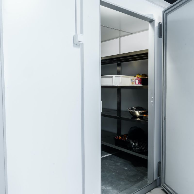 Refrigerator room door in professional kitchen in restaurant